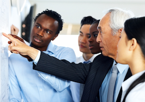 CMPIC instructor teaching an Engineer, Project Manager, and Quality Assurance Professionals about Configuration Management